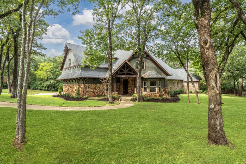 Custom built home nestled on almost 2 acres of private wooded land.